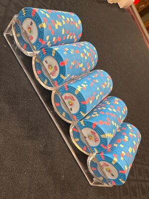 Sands Las Vegas uncirculated $1 chips.